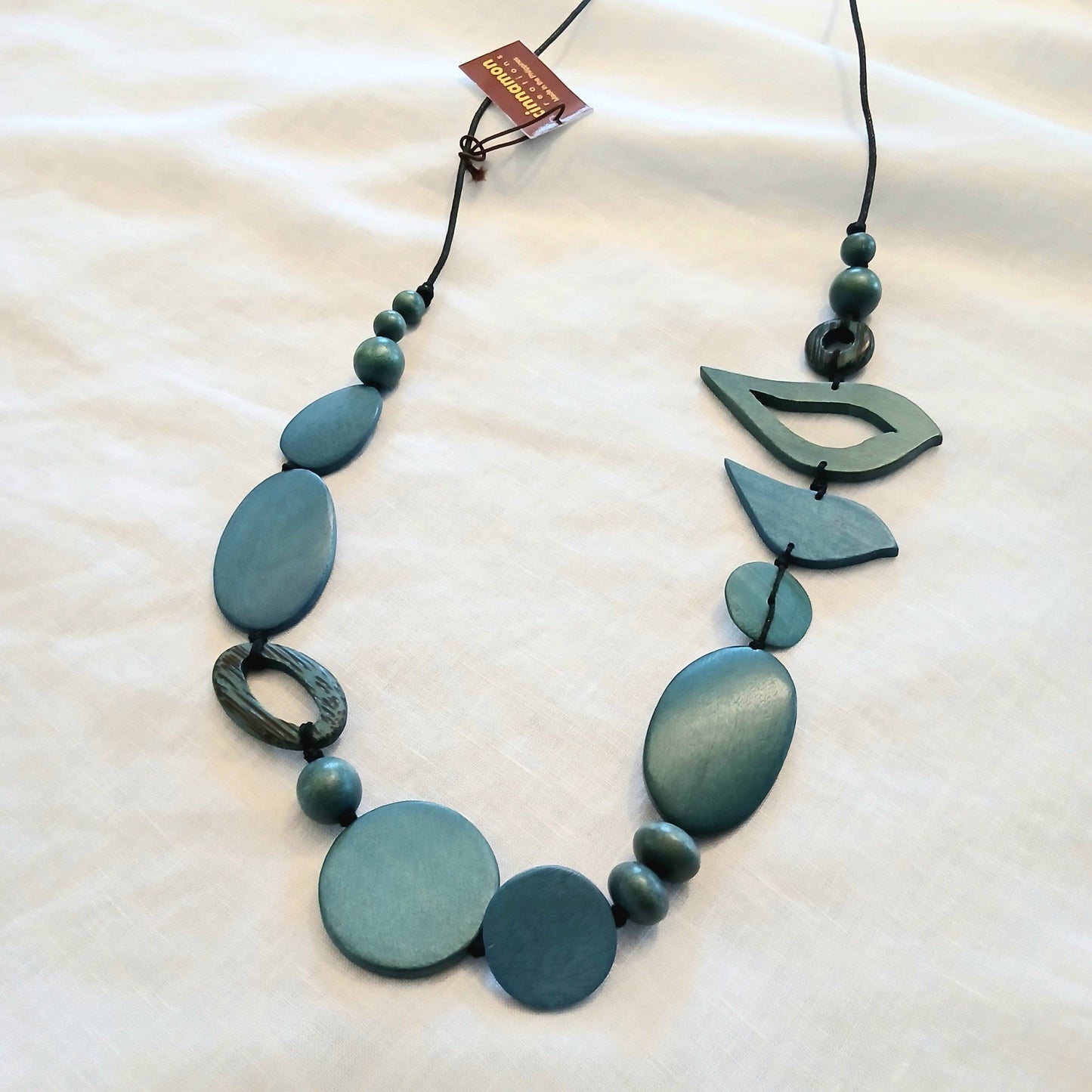 2 Birds Together on Oval Beads Dark Grey