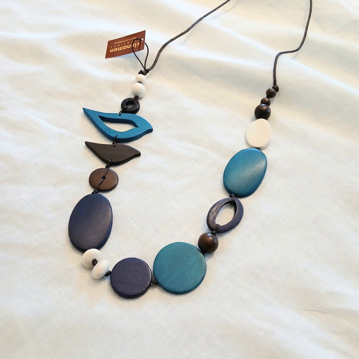 2 Birds Together on Oval Beads Dark Grey
