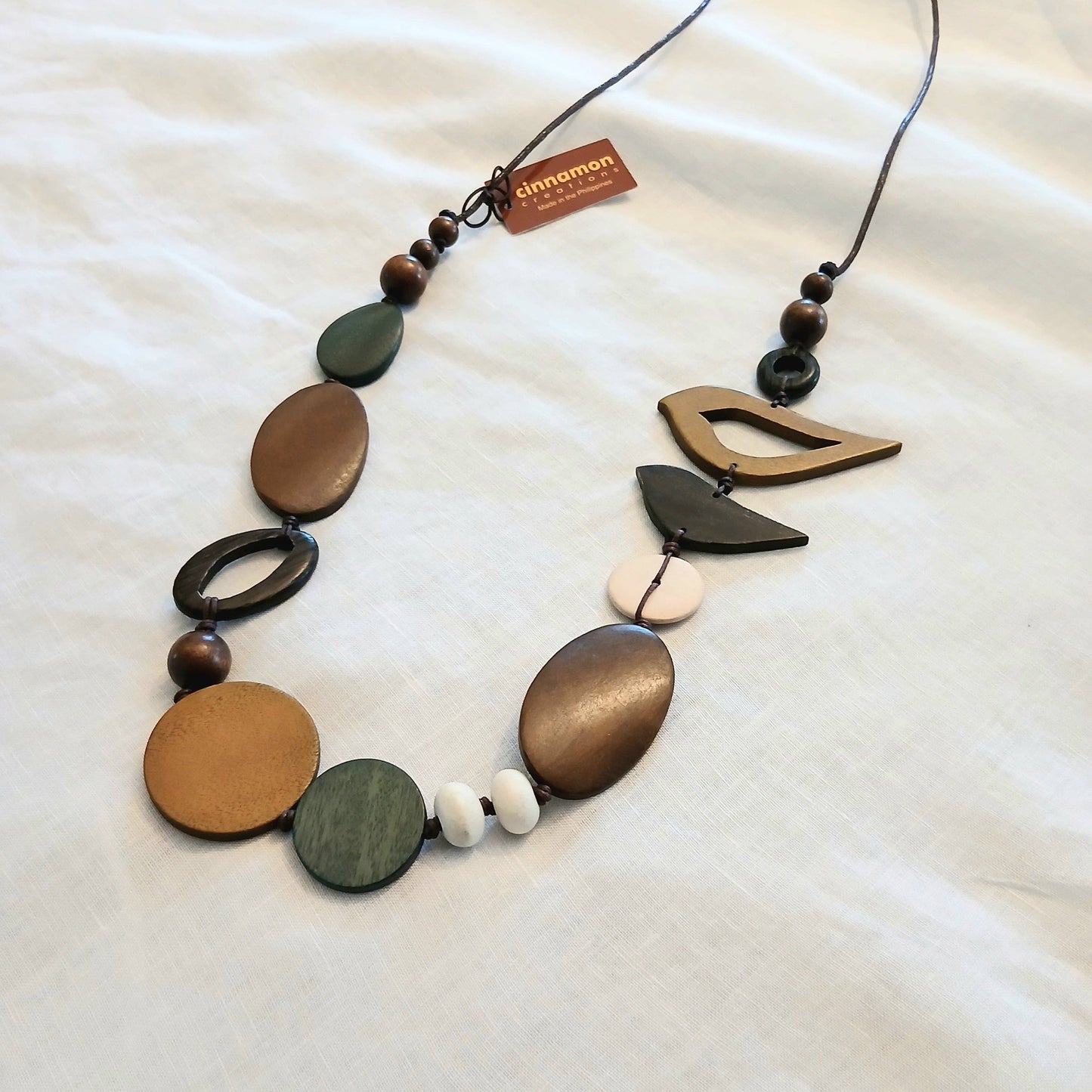 2 Birds Together on Oval Beads Dark Grey