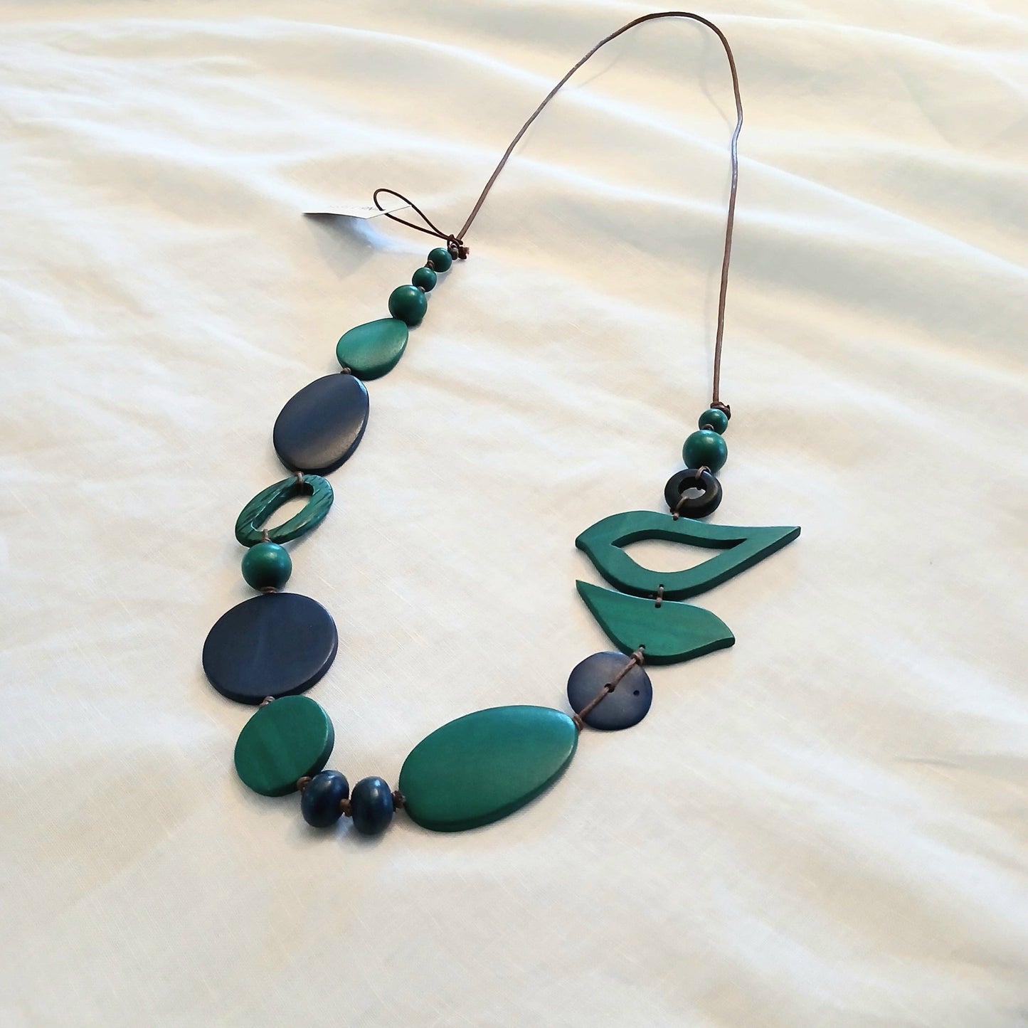 2 Birds Together on Oval Beads Dark Grey